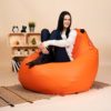 Pufs XXL SMART - Oranžs, no kreisā sāna - pielietojumā